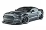 A grey MST RMX 2.5 LBMT 1/10 scale RC drift car featuring a wide-body Mustang-style shell on a white background.