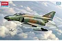 Box art for an Academy 1/32 scale F-4E Phantom II model kit showing the aircraft in flight with camouflage paint and shark mouth nose art.