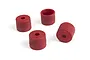 Four small, cylindrical red plastic wheel washers or spacers arranged on a white background.