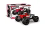Maverick QBit 1/16 scale 4WD RC monster truck in red and grey, shown in front of its product packaging box.