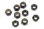 A top-down view of eight black metal nyloc nuts with nylon inserts arranged on a white background.