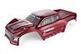 A pre-painted Lava Red Atrek Ambush Pro 1/10 scale RC monster truck body shell shown from a high-angle perspective against a white background.