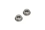 Two metal shielded flanged ball bearings isolated on a white background.
