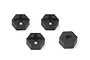 Four black plastic 12mm wheel hex adapters for RC cars, arranged on a white background.