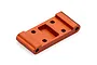 An orange anodized aluminium front lower bulkhead part for an RC car, shown from an elevated angle on a white background.