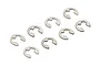 Eight silver-coloured metal E-clips arranged in a loose pattern against a white background.