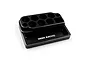 A black aluminium Yeah Racing mini tool stand with multiple circular holes for tools and a rectangular tray area, isolated on a white background.