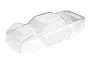 A clear, unpainted polycarbonate RC monster truck body shell shown from a high-angle perspective against a white background.