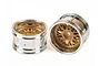 Two Tamiya 1.9-inch wide mesh RC car rims featuring a gold-colored center and a polished chrome outer barrel.
