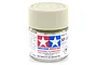 A 10ml jar of Tamiya XF-55 Deck Tan flat acrylic paint with a beige screw-top lid against a white background.