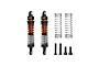 Two GPM Racing orange and black aluminium RC shock absorbers with extra springs and mounting screws on a white background.