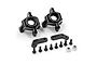 A set of two black aluminium steering hub carriers, two carbon fiber linkage plates, eight small screws, and two metal lock nuts on a white background.