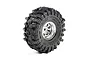 A single Pro-Line 1/30 scale chrome wheel with a black Mickey Thompson Baja Pro X tyre, isolated on a white background.
