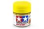 A small glass jar of Tamiya X-24 Clear Yellow gloss acrylic paint with a bright yellow plastic screw-top lid against a white background.