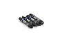 Four Pro-Line Pro-Spec RC shock absorbers with black plastic ends, silver springs, and blue anodized collars arranged on a white background.
