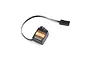 Spektrum SX112 micro analog surface servo with black casing, orange label, and attached wire lead with connector.