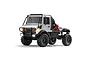 A silver MN Model Unimog RC rock crawler truck with black roll cage, off-road tires, and illuminated headlights on a white background.
