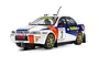 A 1/32 scale Scalextric Subaru Impreza slot car featuring the 1997 Thailand Rally livery with Havoline and Caltex branding.
