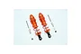 Two orange GPM Racing aluminium adjustable RC shock absorbers with mounting hardware on a white background.