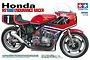 Box art for Tamiya 1/12 scale Honda RS1000 Endurance Racer model kit featuring a detailed illustration of the red and white racing motorcycle.