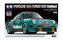 Tamiya 1/24 scale Porsche 934 Turbo RSR Vaillant model kit box art featuring a teal racing car with Vaillant branding.