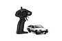 Kyosho First Mini-Z Initial D Toyota Trueno AE86 RC car in white and black with its black pistol-grip radio transmitter on a white background.