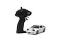 Kyosho First Mini-Z Initial D Mazda Savanna RX-7 FC3S RC car in white with its black pistol-grip transmitter on a white background.