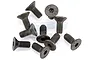 A collection of ten black metal countersunk hex head screws scattered on a white surface.