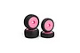 Four RC buggy wheels with black rubber treaded tyres and bright pink dish rims, arranged in two stacks on a white background.