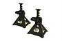 Two black 1/10 scale RC jack stands standing on a white background.