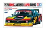 Box art for Tamiya 1/24 scale 1978 Ford Zakspeed Capri Turbo model kit showing a black, yellow, and red racing car with Mampe and Bosch branding.