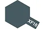 A graphic showing a dark blue-grey hexagon with a small rectangular tab extending from the bottom right corner containing the white text XF18.