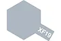 A digital graphic showing a light grey hexagon with a small rectangular tab extending from the bottom right corner containing the white text XF19.