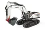 A white and black Huina 1594-W 1/14 scale RC excavator model with a metal bucket and tracked undercarriage on a white background.