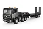 A silver and black HuiNa 1318 RC semi-truck with a flatbed trailer against a white background.