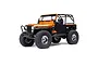 Copper brown Axial SCX10 III Jeep CJ-7 V2 RC rock crawler on a white background.