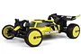 Maverick MiCROBE Flux 1/24 scale RC buggy in yellow and black, featuring off-road tires, a rear wing, and detailed body graphics.