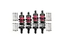 A set of four GPM Racing aluminium RC shock absorbers in red and black, with two additional loose springs on each side.