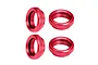 Four red anodized aluminium shock collars for RC cars, featuring a knurled outer edge and internal threading.
