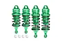 Four green GPM Racing adjustable aluminium RC shock absorbers with black springs and four white plastic ball ends on a white background.
