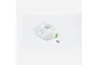 A white foam RC plane cowl with a small green accent and two small black mounting screws on a white background.