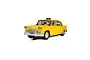 A 1/32 scale Scalextric James Bond Checker Taxi Cab slot car from Live and Let Die, featuring a yellow body and taxi signage.