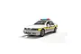 A 1/32 scale Scalextric Ford Sierra Sapphire Essex Police slot car in white with blue and yellow police livery on a white background.