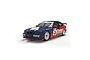 A 1/32 scale Scalextric BMW E36 320i slot car in Castrol racing livery, featuring blue, red, and white paint with number 3 decals.