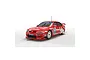 A 1/32 scale Scalextric slot car model of the 1999 Nissan Primera BTCC race car driven by Matt Neal, featuring red livery with Team Dynamics and Michelin branding.