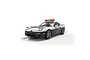 A 1/32 scale Scalextric Mazda RX7 FD Japanese police slot car in white and black livery with a red light bar on the roof, shown on a white background.