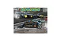 Scalextric 1/32 scale Lotus 72 and 79 slot car twin pack box art featuring two black and gold Formula 1 cars on a racetrack.