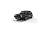 A black Scalextric 1/32 scale Volkswagen Golf MK1 GTI slot car on a white background.