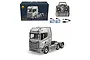 Huina Scania 770S RC semi truck in grey, including its retail box, remote controller, two batteries, and a USB charging cable.