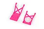 Two bright pink Traxxas RC skid plates, one flat and one braced, isolated on a white background.
